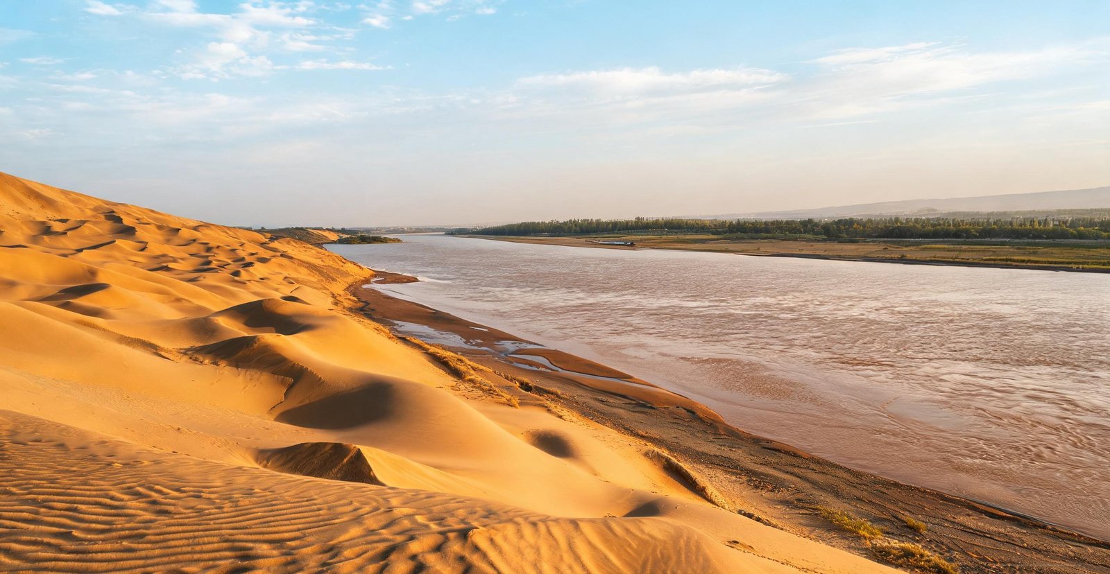 Dunes meeting the Yellow River at Shapotou, Ningxia