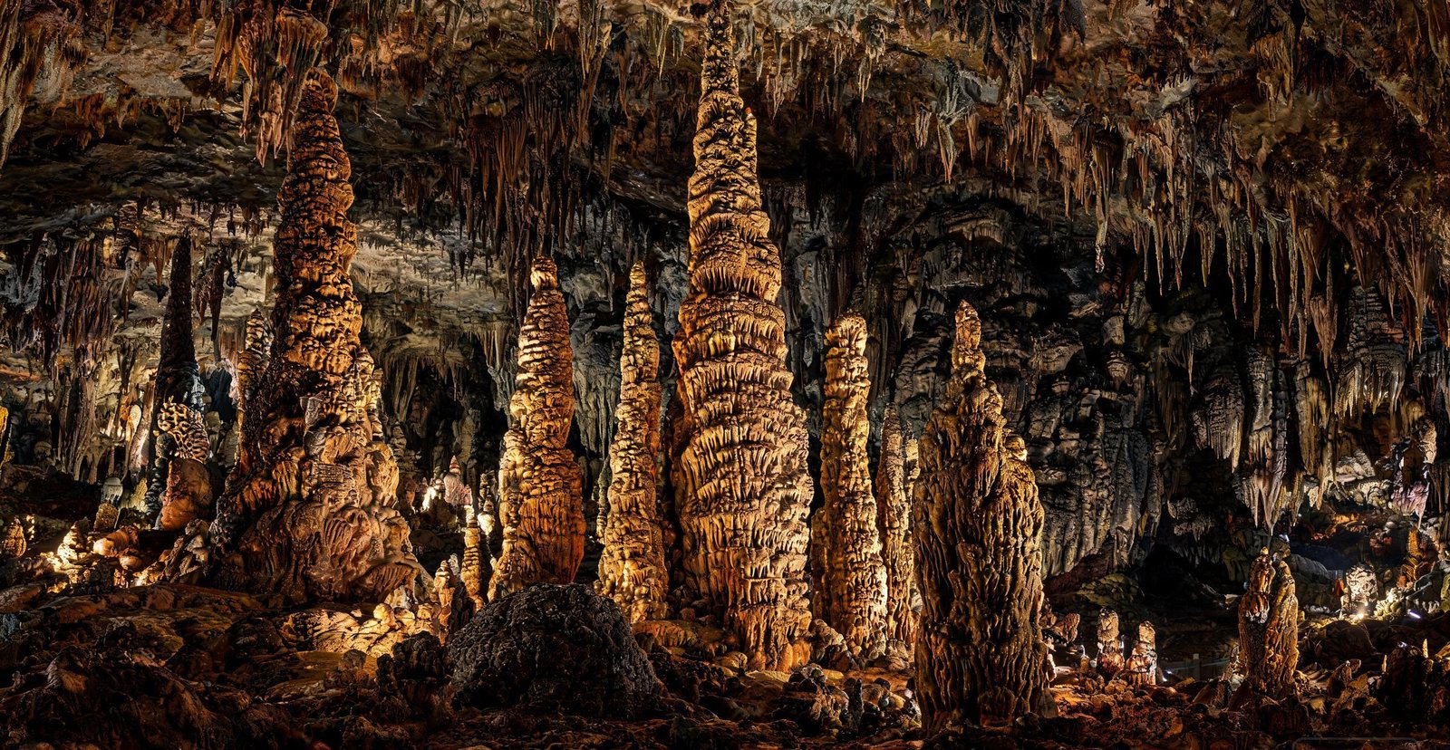 Stalagmites lit up inside Zhijin Cave, Guizhou